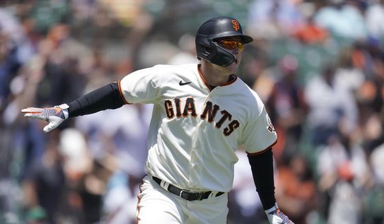 San Francisco Giants&#39; Joc Pederson watches his two-run home run during the first inning of a baseball game against the New York Mets in San Francisco, Wednesday, May 25, 2022. (AP Photo/Jeff Chiu) **FILE**