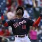 Washington Nationals&#39; Victor Robles celebrates his three-run home run during the fourth inning of the first baseball game of a doubleheader against the Colorado Rockies, Saturday, May 28, 2022, in Washington. (AP Photo/Nick Wass)