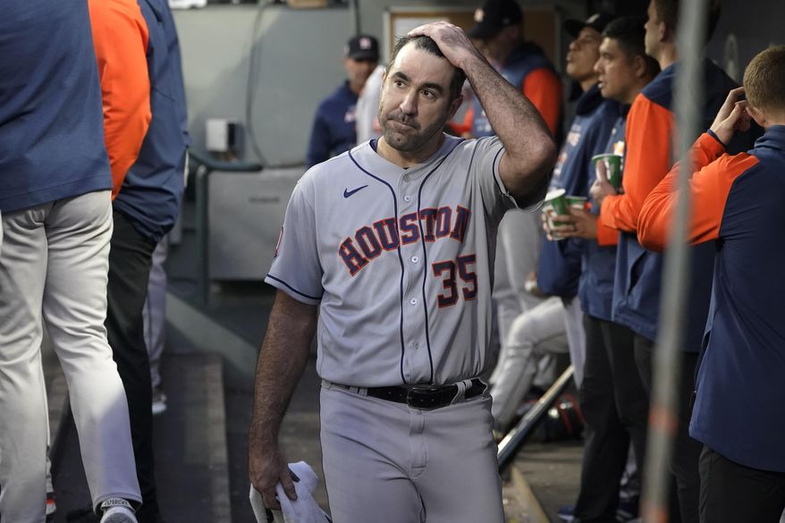 Houston Astros starting pitcher Justin Verlander walks in the dugout after pitching in the sixth inning of the team&#39;s baseball game against the Seattle Mariners, Friday, May 27, 2022, in Seattle. (AP Photo/Ted S. Warren)