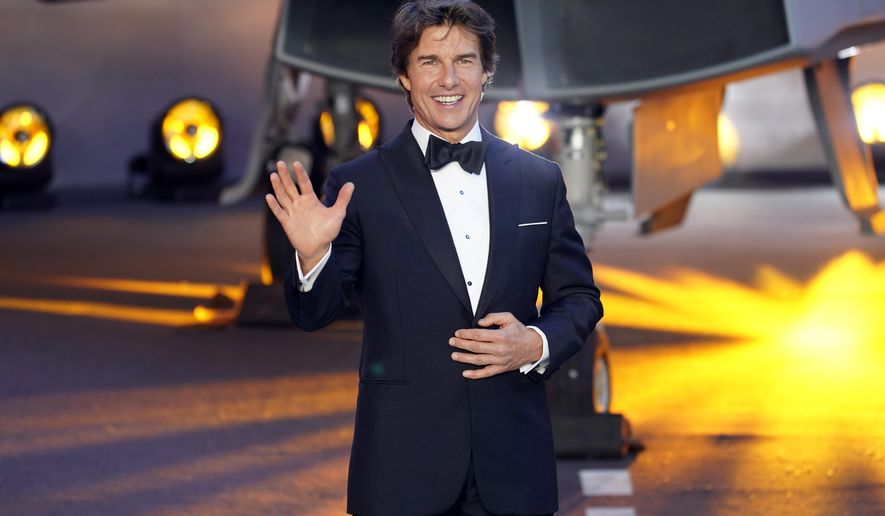 Tom Cruise poses for the media during the &#x27;Top Gun Maverick&#x27; UK premiere at a central London cinema, on Thursday, May 19, 2022. (AP Photo/Alberto Pezzali)