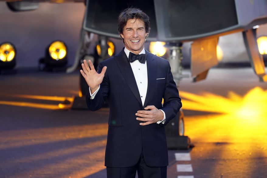 Tom Cruise poses for the media during the &#39;Top Gun Maverick&#39; UK premiere at a central London cinema, on Thursday, May 19, 2022. (AP Photo/Alberto Pezzali)