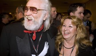 Ronnie and Wanda Hawkins arrive for the Canadian Music Industry Awards in Toronto, Thursday, March 8, 2007. Ronnie Hawkins, a brash rockabilly star from Arkansas who became a patron of the Canadian music scene after moving north and recruiting a handful of local musicians later known as the Band, died Sunday, May 29, 2022. He was 87. (Frank Gunn/The Canadian Press via AP, File)