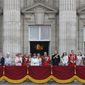 Britain&#39;s Queen Elizabeth II, surrounded by members of the family, stand on the balcony of Buckingham Palace to watch the fly past after the Trooping The Colour parade, in central London, Saturday, June 14, 2014. The balcony appearance is the centerpiece of almost all royal celebrations in Britain, a chance for the public to catch a glimpse of the family assembled for a grand photo to mark weddings, coronations and jubilees. (AP Photo/Lefteris Pitarakis, File)