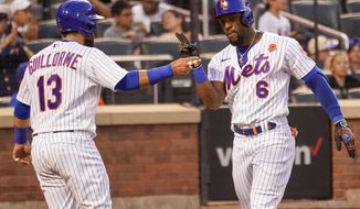 New York Mets&#39; Starling Marte (6) and Luis Guillorme (13) celebrate after scoring off Marte&#39;s two-run home run during the second inning of a baseball game against the Washington Nationals, Monday, May 30, 2022, in New York. (AP Photo/Mary Altaffer)