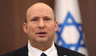 Israeli Prime Minister Naftali Bennett attends a cabinet meeting at the prime minister&#39;s office in Jerusalem, May 15, 2022. Israel said Tuesday, May 31, 2022, that it has proof that Iran stole classified documents from the U.N. atomic energy agency nearly two decades ago and used them to conceal its nuclear activities from international inspectors. (Abir Sultan/Pool Photo via AP, File)