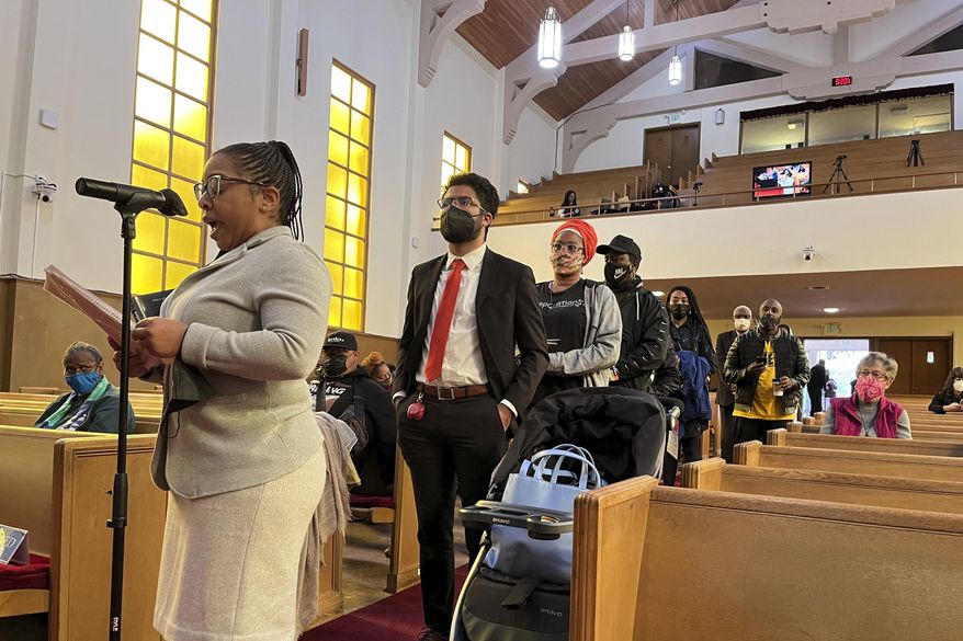 People line up to speak during a reparations task force meeting at Third Baptist Church in San Francisco on April 13, 2022. A report by California&#x27;s first-in-the-nation task force on reparations Wednesday, June 1 will document in detail the harms perpetuated by the state against Black people and recommend ways to address those wrongs. (AP Photo/Janie Har) **FILE**