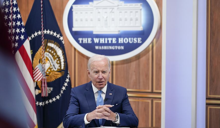 In this file photo, President Joe Biden meets virtually with infant formula manufacturers from the South Court Auditorium on the White House complex in Washington, Wednesday, June 1, 2022, as his administration works to ease nationwide shortages by importing foreign supplies and using the Defense Production Act to speed domestic production. (AP Photo/Susan Walsh)  **FILE**