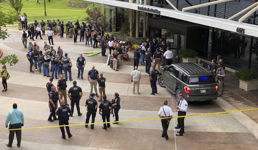 Emergency personnel respond to a shooting at the Natalie Medical Building on the St. Francis Hospital campus Wednesday, June 1, 2022 in Tulsa, Okla. (Ian Maule/Tulsa World via AP)