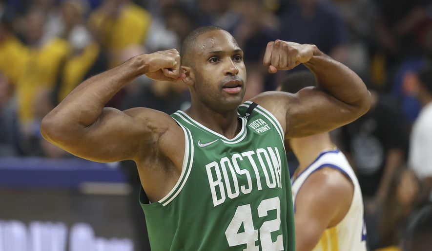 Boston Celtics center Al Horford (42) celebrates during the second half of Game 1 of basketball&#39;s NBA Finals against the Golden State Warriors in San Francisco, Thursday, June 2, 2022. (AP Photo/Jed Jacobsohn) **FILE**