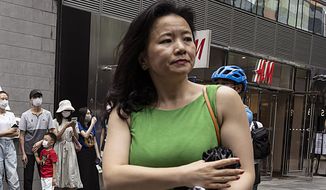Cheng Lei, a Chinese-born Australian journalist for CGTN, the English-language channel of China Central Television, attends a public event in Beijing on Aug. 12, 2020. The Australian partner of the journalist who has been detained in China for nearly two years said on Thursday, June 2, 2022, that she is being denied the chance to speak with her family and consular staff, and her health is declining due to a poor prison diet. (AP Photo/Ng Han Guan, File)