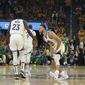 Golden State Warriors guard Stephen Curry, right, celebrates with forward Draymond Green (23) during the first half of Game 1 of basketball&#39;s NBA Finals against the Boston Celtics in San Francisco, Thursday, June 2, 2022. (AP Photo/Jed Jacobsohn)