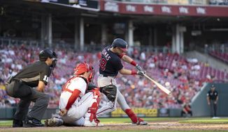 Washington Nationals&#39; Lane Thomas (28) hits a solo home run during the fifth inning of the team&#39;s baseball game against the Cincinnati Reds on Friday, June 3, 2022, in Cincinnati. (AP Photo/Jeff Dean)