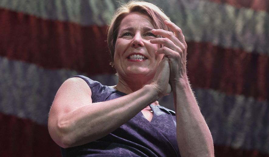 Massachusetts Attorney General, and candidate for governor, Maura Healey greets delegates before giving a speech during the state's Democratic party convention, Saturday, June 4, 2022, in Worcester, Mass. (AP Photo/Michael Dwyer)