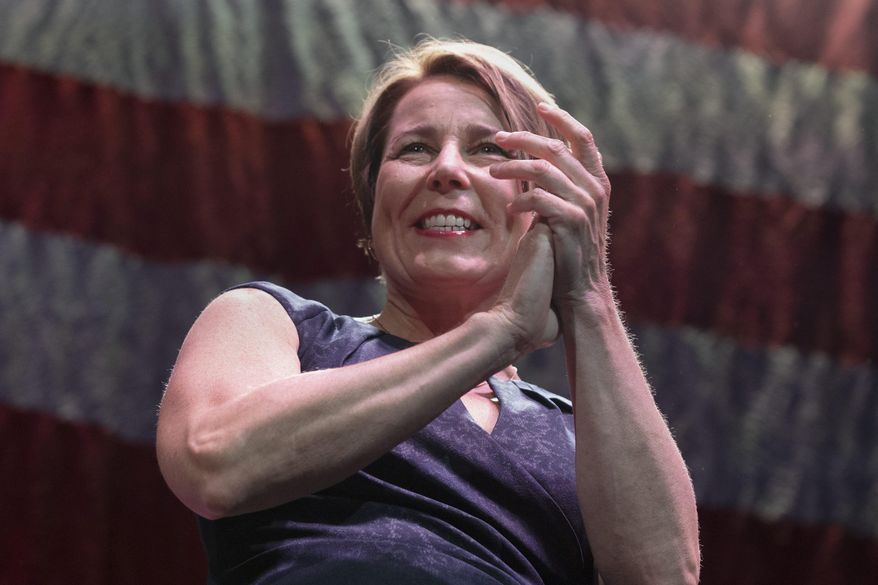 Massachusetts Attorney General, and candidate for governor, Maura Healey greets delegates before giving a speech during the state's Democratic party convention, Saturday, June 4, 2022, in Worcester, Mass. (AP Photo/Michael Dwyer)
