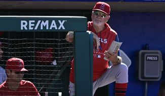 Los Angeles Angels manager Joe Maddon in action during a baseball game against the Philadelphia Phillies, Sunday, June 5, 2022, in Philadelphia. (AP Photo/Derik Hamilton)