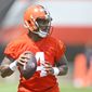 Cleveland Browns quarterback Deshaun Watson looks to pass during an NFL football practice at the team&#39;s training facility Wednesday, June 1, 2022, in Berea, Ohio. (AP Photo/David Richard)