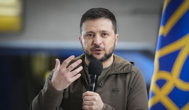 Ukrainian President Volodymyr Zelenskyy answers media questions during a press conference in a city subway under a central square in Kyiv, Ukraine, on April 23, 2022. (AP Photo/Efrem Lukatsky, File)