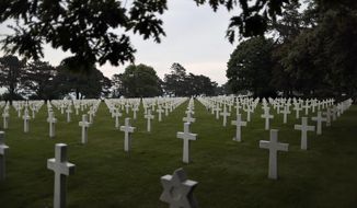 General view of headstones in the US cemetery of Colleville-sur-Mer, Normandy, Saturday, June, 4 2022. Several ceremonies will take place to commemorate the 78th anniversary of D-Day that led to the liberation of France and Europe from the German occupation. (AP Photo/Jeremias Gonzales)