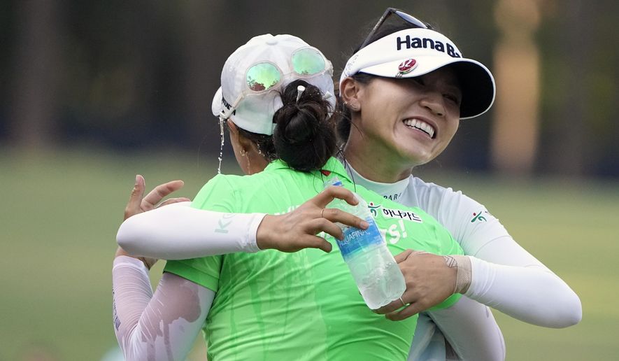 Minjee Lee, of Australia, left embraces Lydia Ko, of New Zealand, after the final round of the U.S. Women&#39;s Open golf tournament at the Pine Needles Lodge &amp;amp; Golf Club in Southern Pines, N.C., on Sunday, June 5, 2022. Minjee Lee won the match. (AP Photo/Chris Carlson)