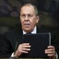 Russian Foreign Minister Sergey Lavrov holds documents during a press conference in Moscow, Russia, Friday, April 8, 2022. Serbia says that a planned visit by Russia&#39;s foreign minister to the Balkan country will not take place. The announcement followed reports that Serbia&#39;s neighbors, Bulgaria, North Macedonia and Montenegro refused to allow Lavrov&#39;s plane to fly through their airspace to reach Serbia. (AP Photo/Alexander Zemlianichenko, Pool)