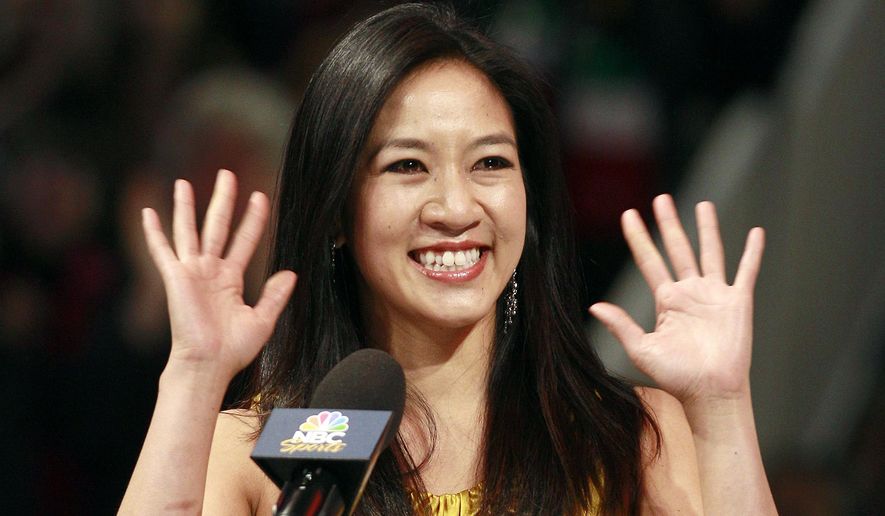 Former figure skater Michelle Kwan waves at an on-ice recognition for her World Figure Skating Hall of Fame induction at the U.S. Figure Skating Championships in San Jose, Calif., Saturday, Jan. 28, 2012. (AP Photo/Jeff Chiu) **FILE**