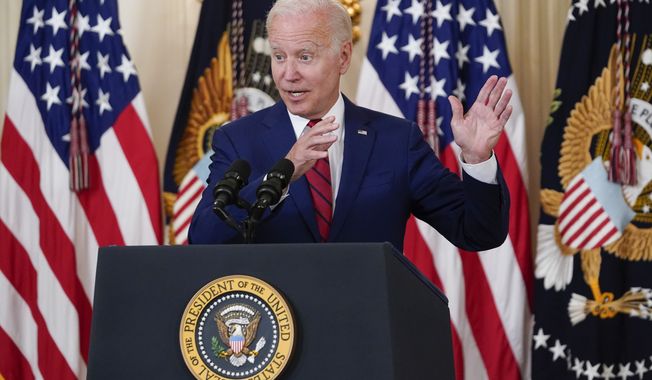 President Joe Biden speaks before signing into law nine bipartisan bills that will honor and improve care for America&#x27;s veterans during an event in the State Dining room of the White House in Washington, Tuesday, June 7, 2022. (AP Photo/Susan Walsh)