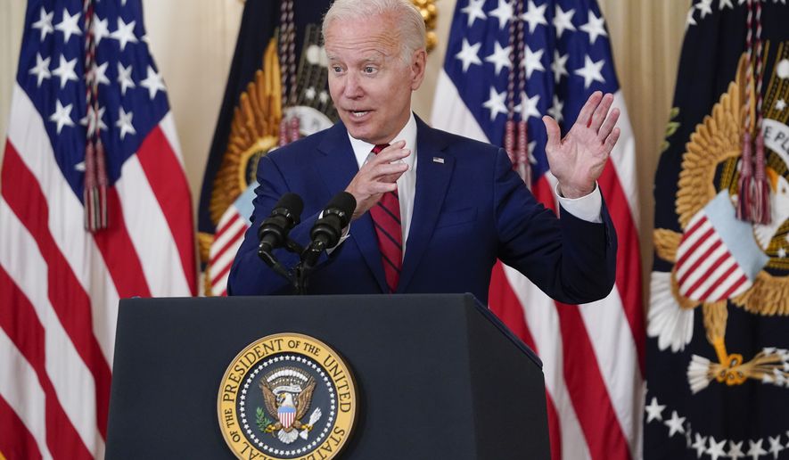 President Joe Biden speaks before signing into law nine bipartisan bills that will honor and improve care for America&#39;s veterans during an event in the State Dining room of the White House in Washington, Tuesday, June 7, 2022. (AP Photo/Susan Walsh)