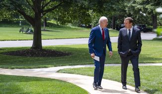President Joe Biden walks with Sen. Chris Murphy, D-Conn., as they talk about gun control outside the Oval Office of the White House, Tuesday, June 7, 2022, in Washington. (AP Photo/Evan Vucci)