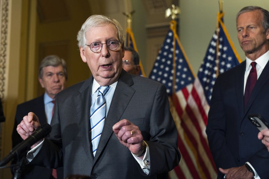 Senate Minority Leader Mitch McConnell of Ky., with Sen. Roy Blunt, R-Mo., left, and Sen. John Thune, R-S.D., right, speaks to reporters during a news conference following the Republican policy luncheon on Capitol Hill, Tuesday, June 7, 2022, in Washington. (AP Photo/Manuel Balce Ceneta)