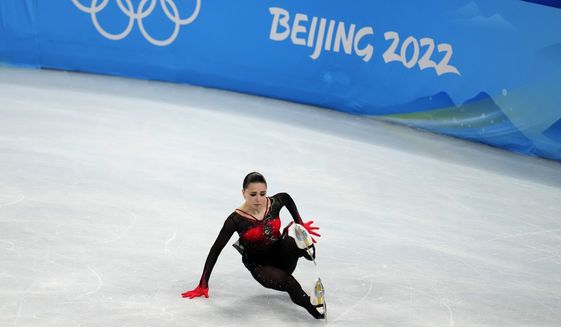 Kamila Valieva, of the Russian Olympic Committee, falls in the women&#39;s free skate program during the figure skating competition at the 2022 Winter Olympics, Thursday, Feb. 17, 2022, in Beijing. No 15-year-old figure skaters will be allowed to compete at the 2026 Olympics following the controversy surrounding Russian competitor Kamila Valieva at this year&#39;s Beijing Games. A new age limit for figure skaters at senior international events was passed Tuesday, June 7, 2022 by the International Skating Union in a 110-16 vote that will raise the minimum age to 17 before the next Winter Olympics in Milan-Cortina d’Ampezzo, Italy. (AP Photo/Natacha Pisarenko, File) **FILE**