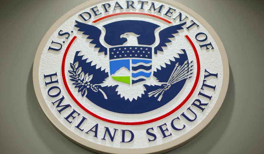 The Department of Homeland Security logo is seen during a news conference in Washington, Feb. 25, 2015. DHS says a looming Supreme Court decision on abortion, an increase of migrants at the U.S.-Mexico border and the midterm elections are potential triggers for extremist violence over the next six months. DHS said June 7, 2022, in the National Terrorism Advisory System bulletin the U.S. was in a &quot;heightened threat environment&quot; already and these factors may worsen the situation. (AP Photo/Pablo Martinez Monsivais, File)