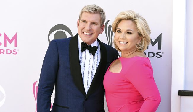 Todd Chrisley, left, and his wife, Julie Chrisley, pose for photos at the 52nd annual Academy of Country Music Awards on April 2, 2017, in Las Vegas. The couple, stars of the reality television show “Chrisley Knows Best,” have been found guilty in Atlanta on federal charges including bank fraud and tax evasion Tuesday, June 7, 2022. (Photo by Jordan Strauss/Invision/AP, File)