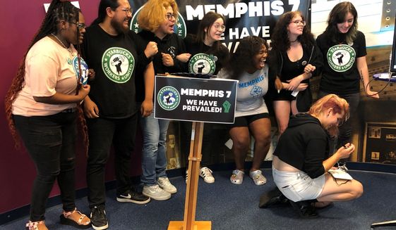 A group of fired Starbucks employees celebrate the result of a vote to unionize one of the coffee company&#39;s locations on Tuesday, June 7, 2022, in Memphis, Tenn. The so-called &amp;quot;Memphis Seven&amp;quot; jumped for joy, hugged each other and wept after a count held by the National Labor Relations Board showed an 11-3 vote in favor of unionization of a Starbucks in Memphis. Starbucks said they were fired for violating company policies, but the seven say they were let go in retaliation for unionization efforts. (AP Photo/Adrian Sainz)