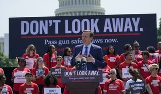 Sen. Chris Murphy, D-Conn., speaks during a protest near Capitol Hill in Washington, Wednesday, June 8, 2022, sponsored by Everytown for Gun Safety and its grassroots networks, Moms Demand Action and Students Demand Action. Protesters are demanding that Congress act on gun safety issues. (AP Photo/Susan Walsh)