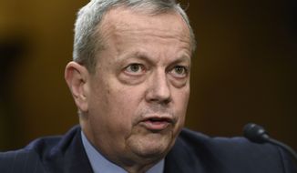 In this Feb. 25, 2015, file photo, retired Gen. John Allen testifies on Capitol Hill in Washington, before the Senate Foreign Relations Committee to examine the fight against the Islamic State of Iraq and Syria. (AP Photo/Susan Walsh, File)