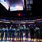 The Boston Celtics stand for the singing of the national anthem before playing against the Golden State Warriors in Game 3 of basketball&#39;s NBA Finals, Wednesday, June 8, 2022, in Boston. (AP Photo/Steven Senne)
