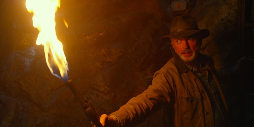 This image released by Universal Pictures shows Sam Neill as Dr. Alan Grant in a scene from "Jurassic World Dominion." (Universal Pictures/Amblin Entertainment via AP)