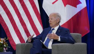 President Joe Biden speaks with with Canadian Prime Minister Justin Trudeau during the Summit of the Americas, Thursday, June 9, 2022, in Los Angeles. (AP Photo/Evan Vucci)