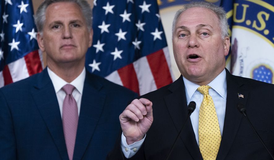 House Minority Leader Kevin McCarthy, of Calif., left, listens as House Minority Whip Rep. Steve Scalise, R-La., speaks during a news conference on the House Jan. 6 Committee, Thursday, June 9, 2022, on Capitol Hill in Washington. (AP Photo/Jacquelyn Martin)