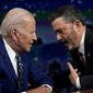 President Joe Biden speaks with host Jimmy Kimmel during a commercial break during the taping of Jimmy Kimmel Live!, Wednesday, June 8, 2022, in Los Angeles prior to attending the Summit of the Americas. (AP Photo/Evan Vucci)