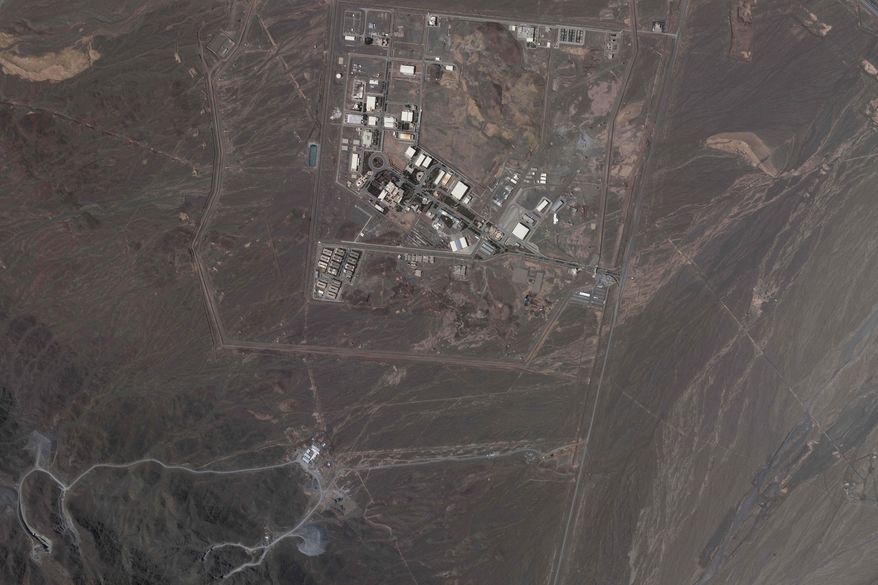 This satellite image from Planet Labs PBC shows Iran&#x27;s underground Natanz nuclear site, as well as ongoing construction to expand the facility in a nearby mountain to the south, near Natanz, Iran, May 9, 2022. Iran plans to install two new cascades of advanced centrifuges at Natanz that will allow Tehran to rapidly enrich more uranium, the U.N.&#x27;s nuclear watchdog said Thursday, June 9, 2022, the latest escalation in the standoff over the country&#x27;s atomic program. (Planet Labs PBC via AP)