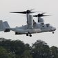 A MV-22B Osprey tiltrotor aircraft flies at Marine Corps Air Facility at Marine Corps Base in Quantico, Va., on Aug. 3, 2012. Officials say a Marine Corps MV-22B Osprey carrying five Marines crashed in the Southern California desert, Wednesday afternoon, June 8, 2022, during training in a remote area near the community of Glamis in Imperial County. Military officials have yet to release official word on the fate of the five Marines. (AP Photo/Haraz N. Ghanbari) **FILE**
