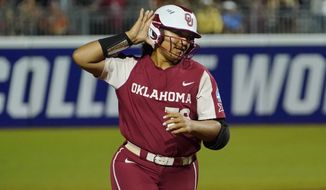 Oklahoma&#39;s Jocelyn Alo (78) gestures to the crowd as she rounds the bases with a home run during the first game of the NCAA Women&#39;s College World Series softball championship series against Texas Wednesday, June 8, 2022, in Oklahoma City. (AP Photo/Sue Ogrocki) **FILE**