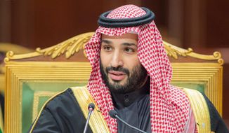 In this photo released by Saudi Royal Palace, Saudi Crown Prince Mohammed bin Salman, speaks during the Gulf Cooperation Council (GCC) Summit in Riyadh, Saudi Arabia, Dec. 14, 2021. (Bandar Aljaloud/Saudi Royal Palace via AP, File)