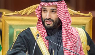 In this photo released by Saudi Royal Palace, Saudi Crown Prince Mohammed bin Salman, speaks during the Gulf Cooperation Council (GCC) Summit in Riyadh, Saudi Arabia, Dec. 14, 2021. After President Joe Biden took office, his administration made clear the president would avoid direct engagement with the country&#39;s de facto leader, Crown Prince Mohammed bin Salman, after U.S. intelligence officials concluded that he likely approved the 2018 killing and dismemberment of U.S.-based journalist Jamal Khashoggi. (Bandar Aljaloud/Saudi Royal Palace via AP, File)