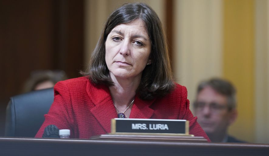 Rep. Elaine Luria, D-Va., listens as the House select committee investigating the Jan. 6 attack on the U.S. Capitol holds its first public hearing to reveal the findings of a year-long investigation, on Capitol Hill, Thursday, June 9, 2022, in Washington. (AP Photo/Andrew Harnik)