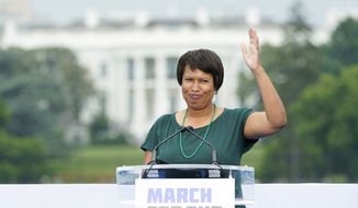 With the White House in the background, District of Columbia Mayor Muriel Bowser waves as she arrives to speak during the second March for Our Lives rally in support of gun control, Saturday, June 11, 2022, in Washington. (AP Photo/Manuel Balce Ceneta)