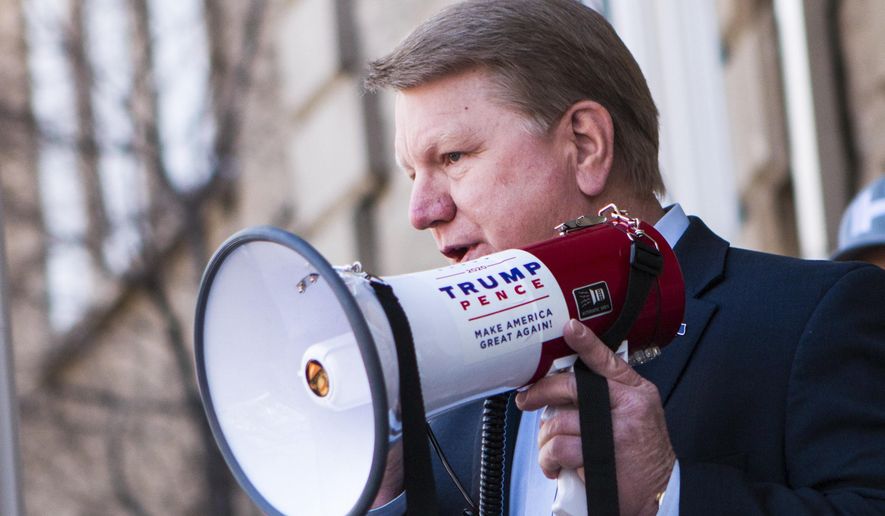 FILE - Former Nevada Assemblyman Jim Marchant addresses a crowd in front of the Nevada Capitol, Thursday March 4, 2021, in Carson, City, Nev., where the Nevada GOP delivered what they described as 120,000 "election integrity violations reports" alleging widespread voter fraud during the 2020 election. Of the seven Republicans running to oversee elections in this political battleground state, Marchant stands out for his full-throated embrace of conspiracy theories and lies about the 2020 election and his promises to toss out voting machines. (Ricardo Torres-Cortez/Las Vegas Sun via AP, File)