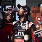 Daniel Suarez drinks some of the wine from the winner&#39;s goblet after a NASCAR Cup Series race, Sunday, June 12, 2022, at Sonoma Raceway in Sonoma, Calif. (AP Photo/D. Ross Cameron)