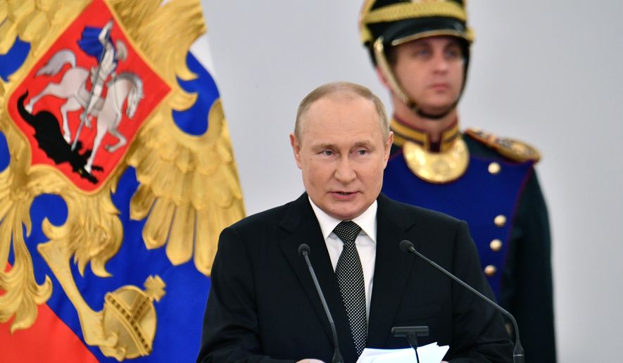 Russian President Vladimir Putin speaks during the State Prize awards ceremony while marking Russia Day in Kremlin in Moscow, Russia, Sunday, June 12, 2022. Since 1992, Russia Day is annually celebrated on June 12 as the Russian Federation&#39;s national holiday. (Evgeny Biyatov, Sputnik, Kremlin Pool Photo via AP)